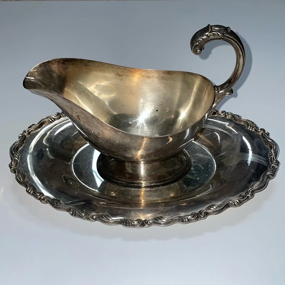 William A Rogers set of silver-plated gravy boat, butter‎ dish, & platter.